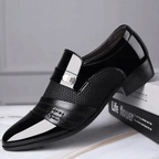 Men's luxury leather loafers by MANDOTOS featuring sleek design and polished finish, perfect for formal or casual wear.