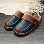 Men's luxury leather slippers by MANDOTOS featuring soft leather upper and comfortable slip-on design.