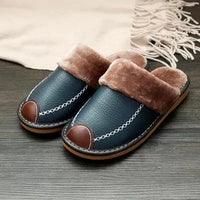 Men's luxury leather slippers by MANDOTOS, featuring soft leather upper and comfortable slip-on design, ideal for indoor wear.