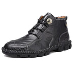 Men's stylish ankle boots by MANDOTOS featuring sleek leather design and modern silhouette, perfect for casual or dressy outfits.