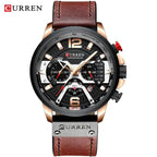 Mandotos military leather chronograph wristwatch with black dial, stainless steel case, and brown leather strap.