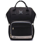 Mandotos Mummy Maternity Bag with multiple compartments, beige fabric, and sturdy handles for stylish pregnancy and postpartum use.
