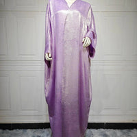 Mandotos Muslim robe abaya in black fabric with elegant flowy design, traditional Islamic fashion for women.