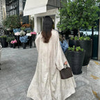 Mandotos Muslim robe abaya in black with flowing fabric and elegant design, suitable for modest Islamic attire.