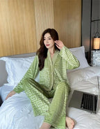 Gold velvet women's pajamas suit by MANDOTOS, featuring a luxurious, soft fabric with a relaxed fit and elegant design.
