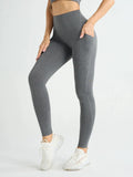 Mandotos high waist women's yoga leggings with pockets, stretch fabric, solid color, suitable for fitness, running, and sports activities.