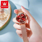 Mandotos OLEVS luxury women's rose gold quartz watch with stainless steel mesh strap and love dial design.