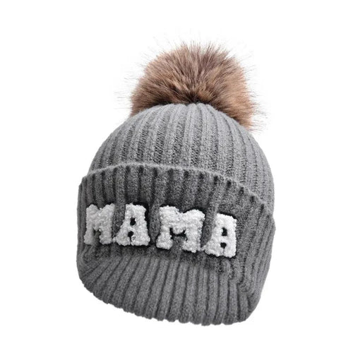 Matching parent-child beanie hats set by MANDOTOS, including three cozy winter knit hats for mama, papa, and baby.