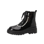 Black patent leather ankle boots by MANDOTOS with sleek design and rounded toe, perfect for stylish everyday wear.