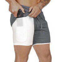 Mandotos Pocket Compression Shorts in black, featuring built-in pockets and stretchy fabric for athletic support and comfort.