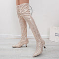 Mandotos pointed over-the-knee high fashion boots with sleek design and stiletto heel, perfect for stylish winter wear.