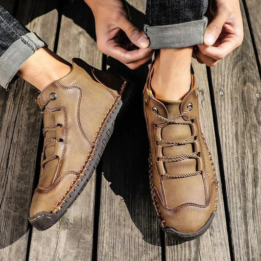 Mandotos premium microfiber leather boots with stylish design and durable construction, featuring smooth leather finish and ankle-high style.
