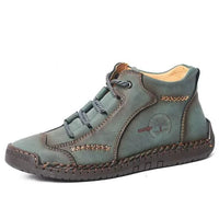Mandotos premium microfiber leather boots with stylish design and durable construction, featuring a sleek ankle-high silhouette.