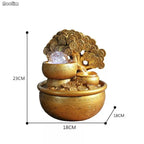 Mandotos Prosperity Gold Water Feature with flowing water and decorative gold accents, outdoor garden fountain display
