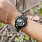 Mandotos men's quartz waterproof sports watch with black dial and stainless steel band, suitable for active wear and outdoor activities.