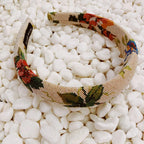 Mandotos Retro Blossom Hairband with colorful floral design on a fabric headband for a vintage-inspired accessory