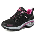 Mandotos running shoes in black and white with breathable mesh upper and cushioned sole for comfortable athletic performance.