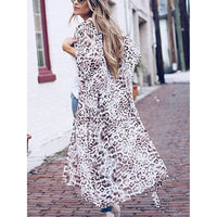 Mandotos Safari Chic Kimono featuring lightweight fabric, animal print design, and relaxed fit for stylish comfort.