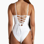 Mandotos Sculpting Beachwear Bodysuit in black, fitted with supportive design and seamless finish for a sleek summer look.