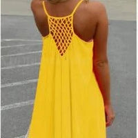 Mandotos Seaside Dream chiffon sundress with flowing fabric and delicate straps, perfect for sunny summer days.