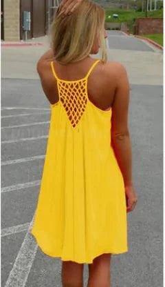 Mandotos Seaside Dream chiffon sundress with flowing fabric and floral pattern, perfect for sunny summer days.