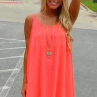 Mandotos Seaside Dream chiffon sundress with flowing fabric and breezy style, perfect for sunny day outdoor wear.