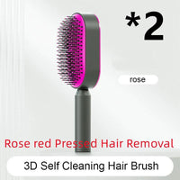 Mandotos self-cleaning hair brush with scalp massage features, showing the brush's ergonomic design and cleaning mechanism.
