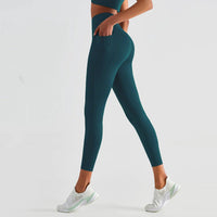 Mandotos ShapeEnhance activewear leggings in black, featuring a high-waist design and stretchy fabric for a comfortable fit.