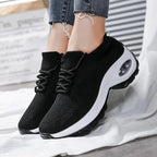 Mandotos women's sports shoes with flying knit sock design, lightweight and flexible athletic sneakers for active wear.