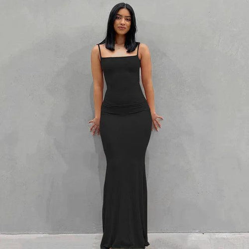Elegant black satin backless gown by MANDOTOS, featuring a sleek design and flowing fabric perfect for formal occasions.