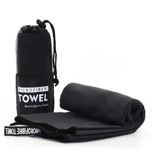 Mandotos Speedy Absorb Microfiber Towel spread out, showing its soft, lightweight fabric ideal for quick drying and travel use.