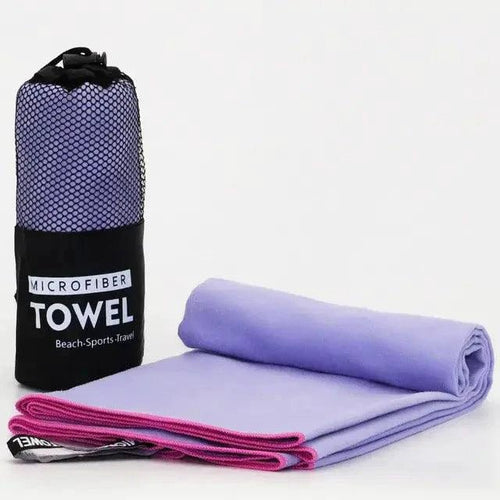 Mandotos Speedy Absorb Microfiber Towel spread out, showcasing its lightweight, quick-drying fabric ideal for travel and sports use.