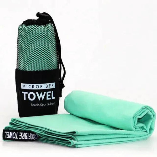 Mandotos Speedy Absorb Microfiber Towel spread out, showing its soft, lightweight fabric ideal for quick drying and travel use.