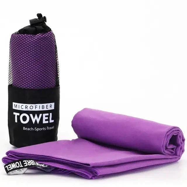 Mandotos Speedy Absorb Microfiber Towel laid out, showing its lightweight, soft fabric and compact size for quick drying.