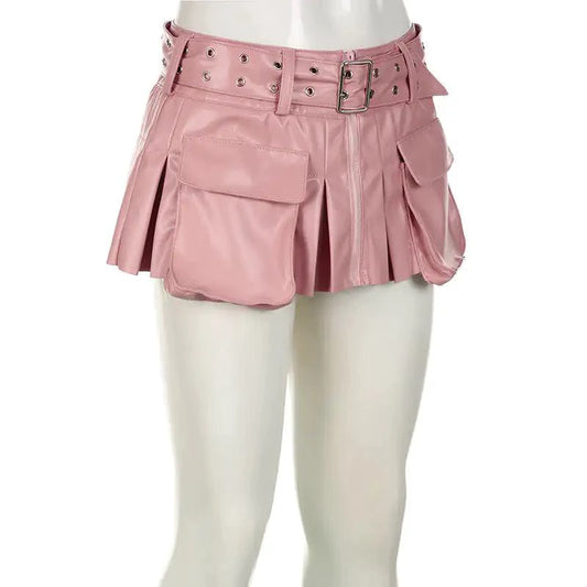 Mandotos Spice faux leather pleated mini skirt hanging on a hanger, showcasing its textured fabric and stylish design.