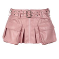 Mandotos Spice faux leather pleated mini skirt with a high waist and sleek design, shown on a model.