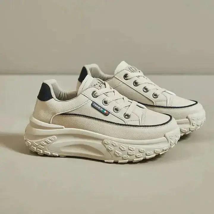 Mandotos stylish orthopedic shoes with supportive design, featuring a sleek black finish and comfortable fit.