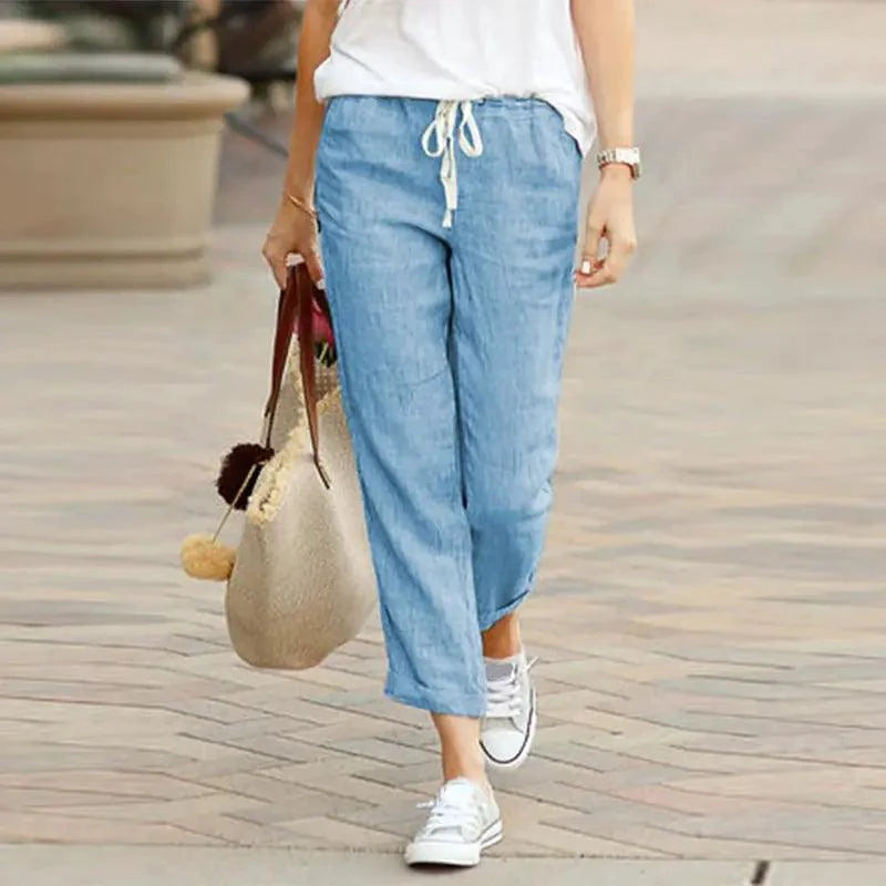 Mandotos Summer Elegance drawstring trousers featuring lightweight fabric and a relaxed fit, perfect for warm weather wear.