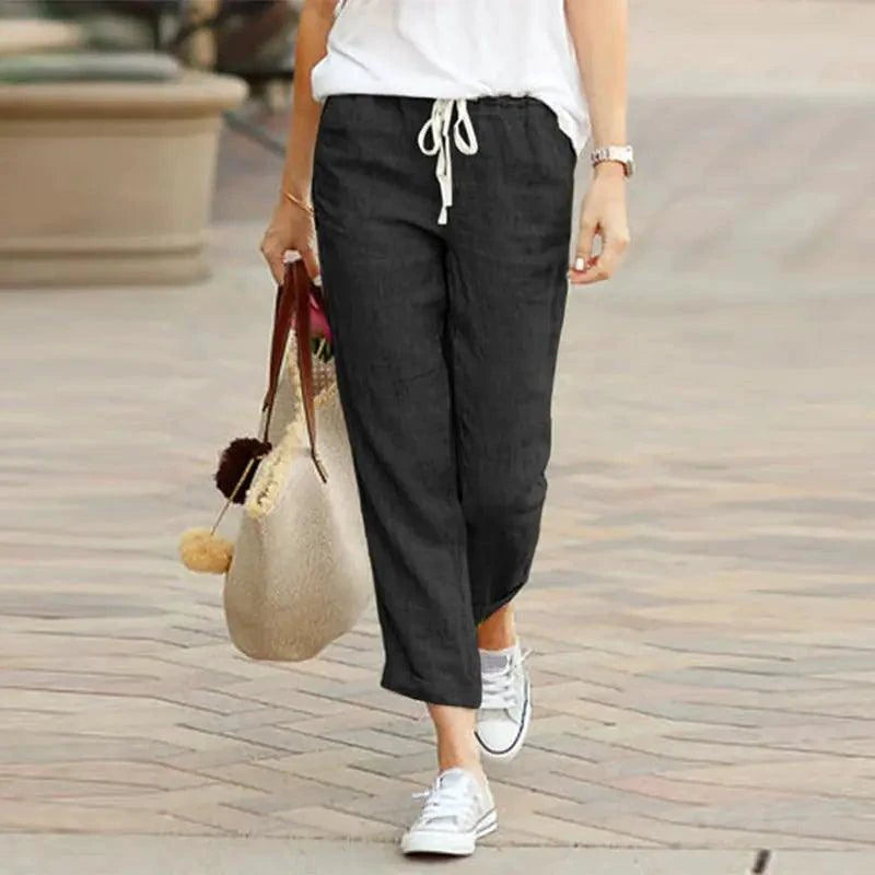 Mandotos Summer Elegance drawstring trousers featuring lightweight fabric, relaxed fit, and stylish design for warm weather wear.