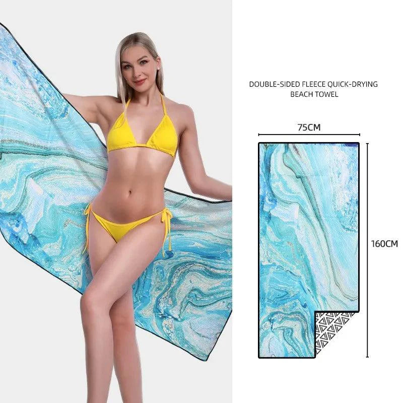Mandotos SwiftDry patterned beach towel with vibrant geometric designs, ideal for beach or poolside lounging.