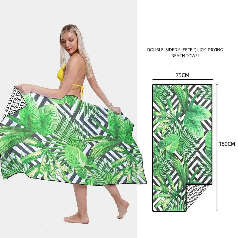 Mandotos SwiftDry patterned beach towel featuring vibrant geometric designs, perfect for beach or poolside lounging.