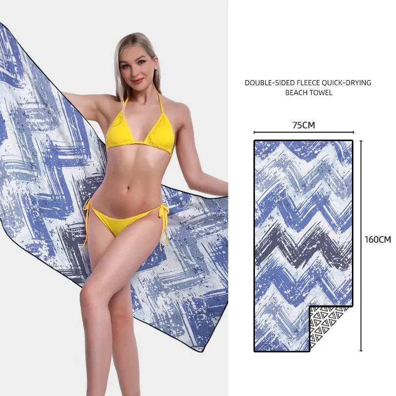 Mandotos SwiftDry patterned beach towel with colorful tropical design, soft and quick-drying for beach and pool use.