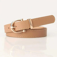 Mandotos Tally vegan leather belt with sleek design and adjustable buckle, perfect for casual and formal wear.
