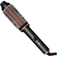 Mandotos Thermal Curl Styler Brush with heated barrel for creating bouncy curls and waves in hair.