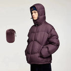 Mandotos thin and portable puff down jacket with solid color, hooded design, lightweight and cozy for cold weather.
