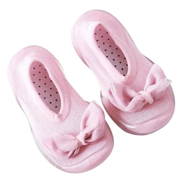 Mandotos toddler shoes in soft fabric with Velcro straps, featuring colorful patterns and sturdy soles for young children.
