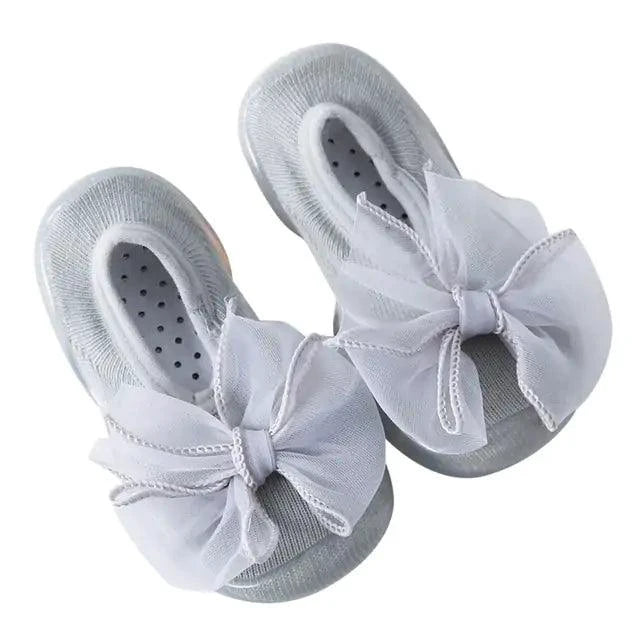 Cute MANDOTOS toddler shoes with soft fabric and velcro straps, designed for comfort and easy wear for young children.