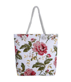 Twin-sided artistic canvas bag by MANDOTOS, featuring vibrant painted designs on durable fabric, perfect for everyday use.