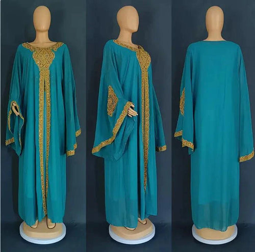 Gold two-piece kaftan abaya dress from MANDOTOS featuring elegant flowing fabric and intricate design for stylish modest wear.