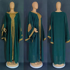 Mandotos two-piece gold kaftan abaya set with intricate embroidery and flowing fabric, perfect for elegant traditional wear.